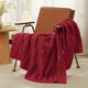 Snuggle Sac cable chenille knit throw blanket in Red draped over a chair creating a cozy corner #color_Red