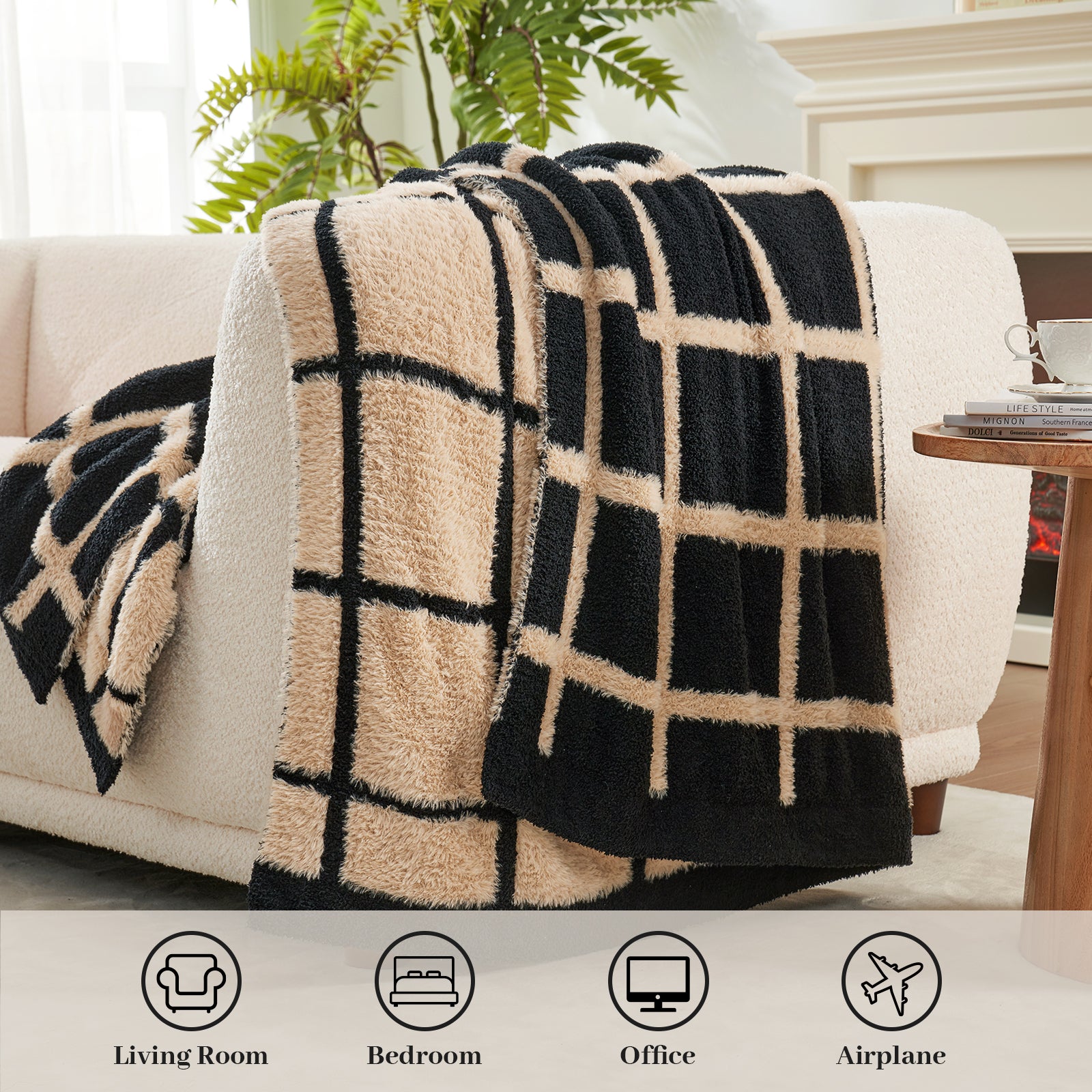 Black and beige checkered Faux Fur Knit Throw Blanket draped over a white couch in a living room setting.#color_Black