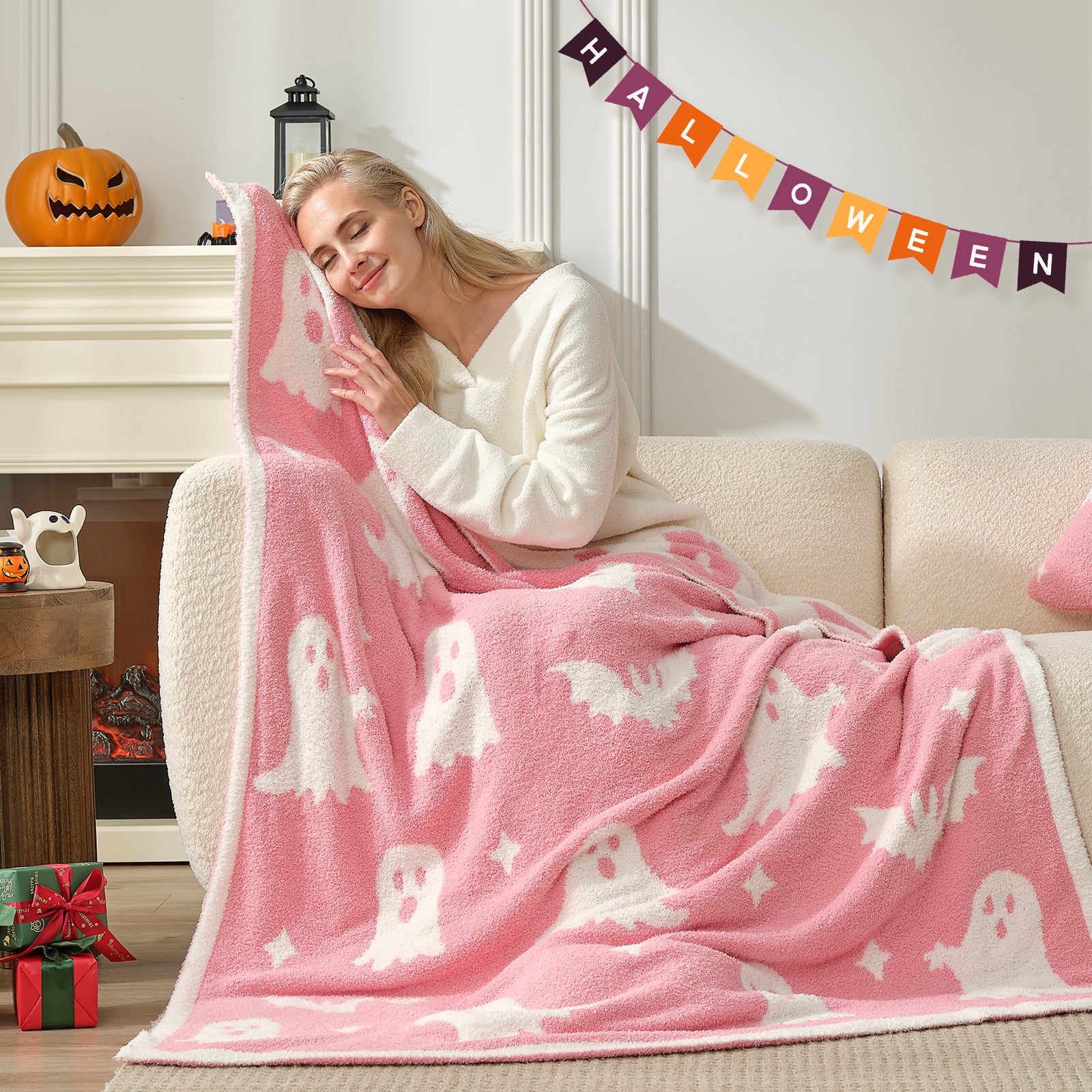 Reversible pink ghost throw blanket