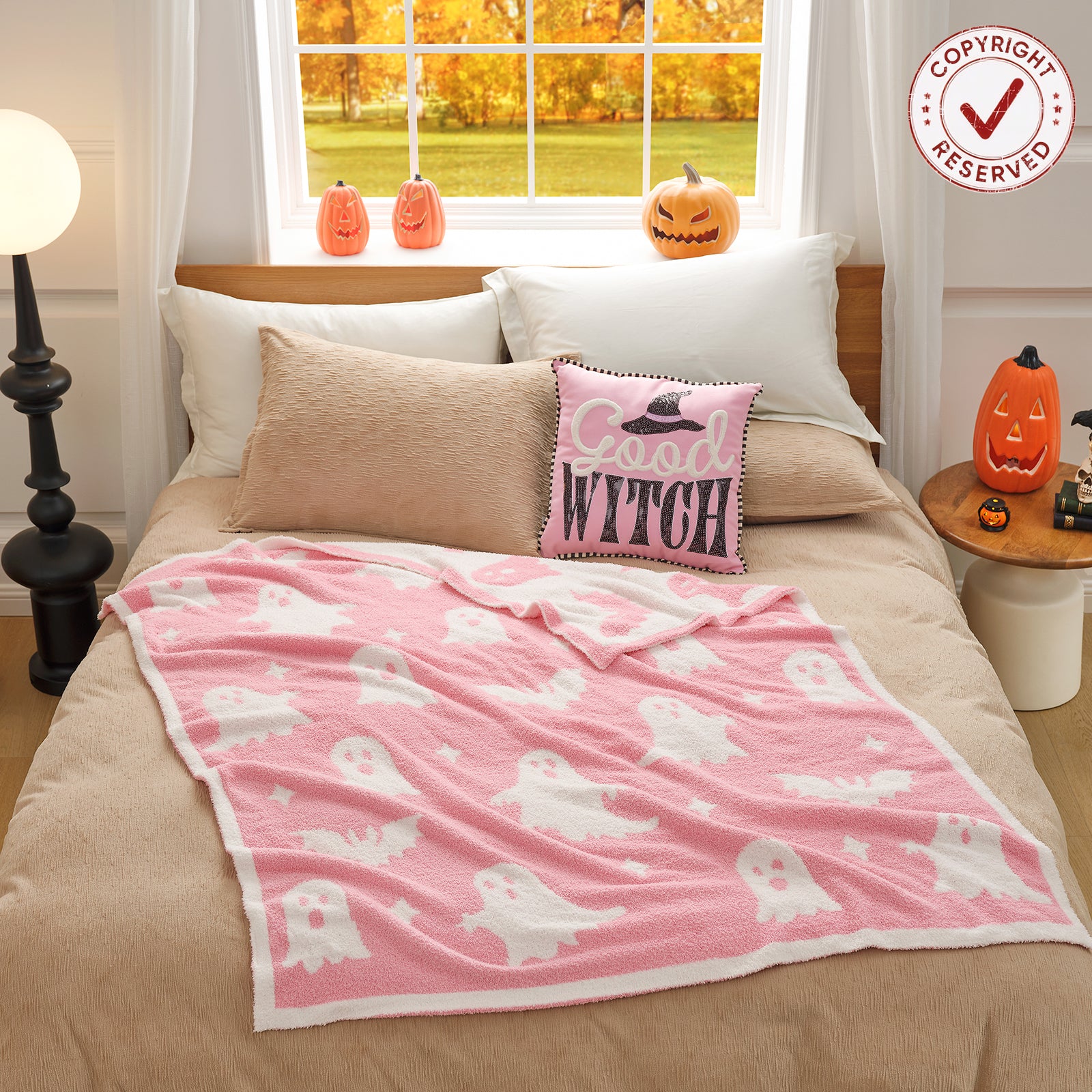 Reversible pink ghost throw blanket