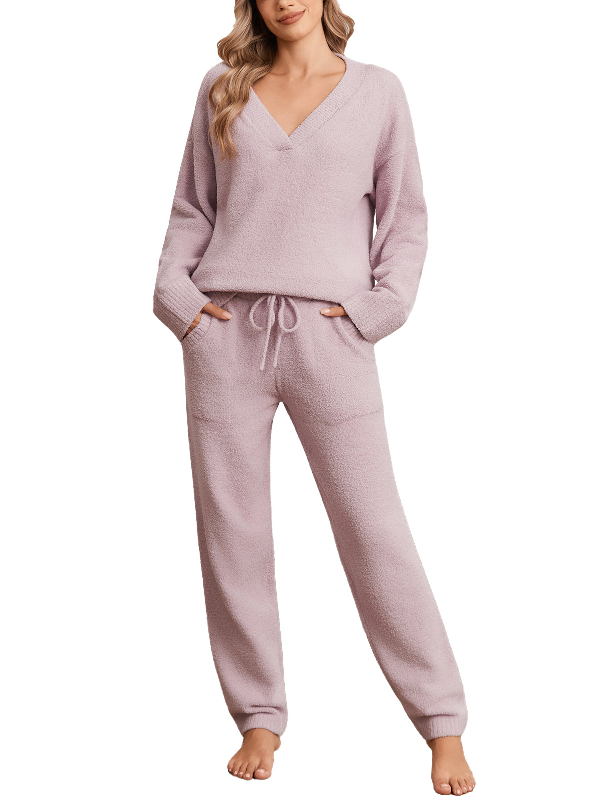 Woman wearing a pink lounge set on a white background #color_Purple
