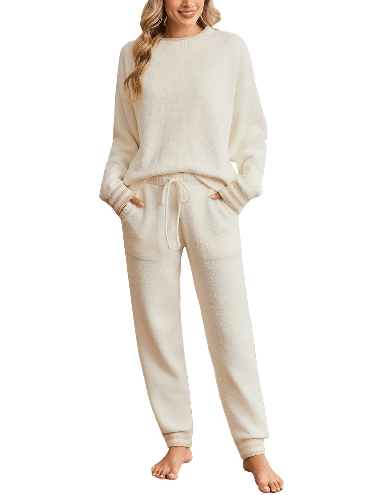 Woman wearing a cream-colored loungewear set on a white background #color_Ivory