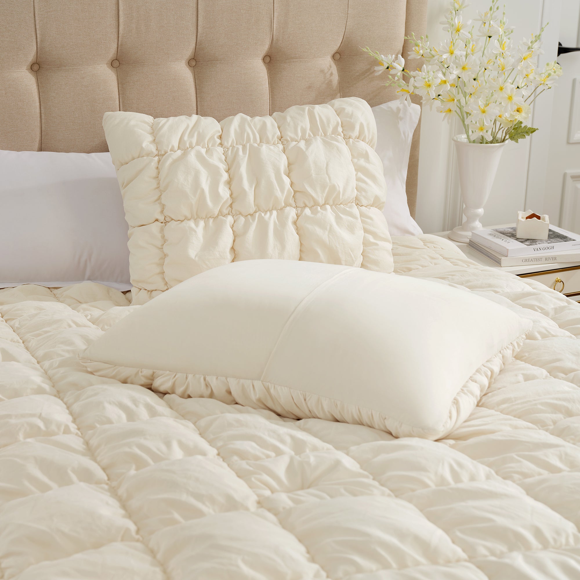Close up of Pillow of Snuggle Sac All-Season Bubble Comforter Set in beige on bed#color_Beige