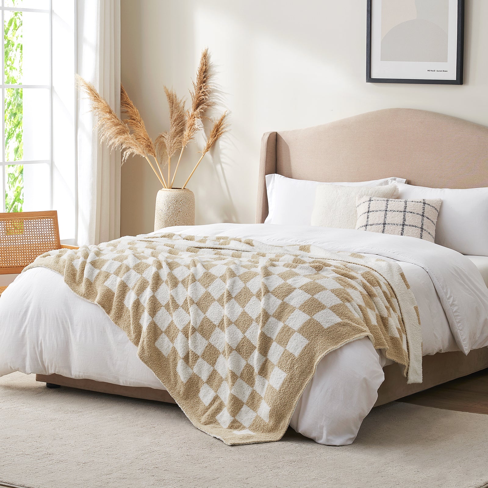 Neatly made bed with a beige and white checkered blanket in a bright bedroom. #color_Checkered Beige