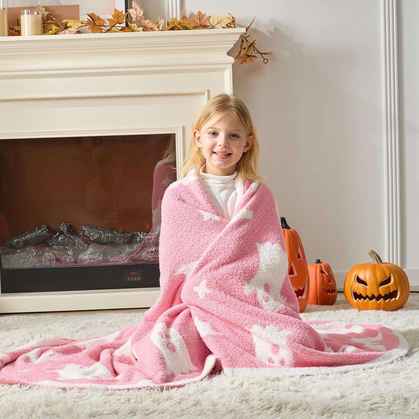 Reversible pink ghost throw blanket