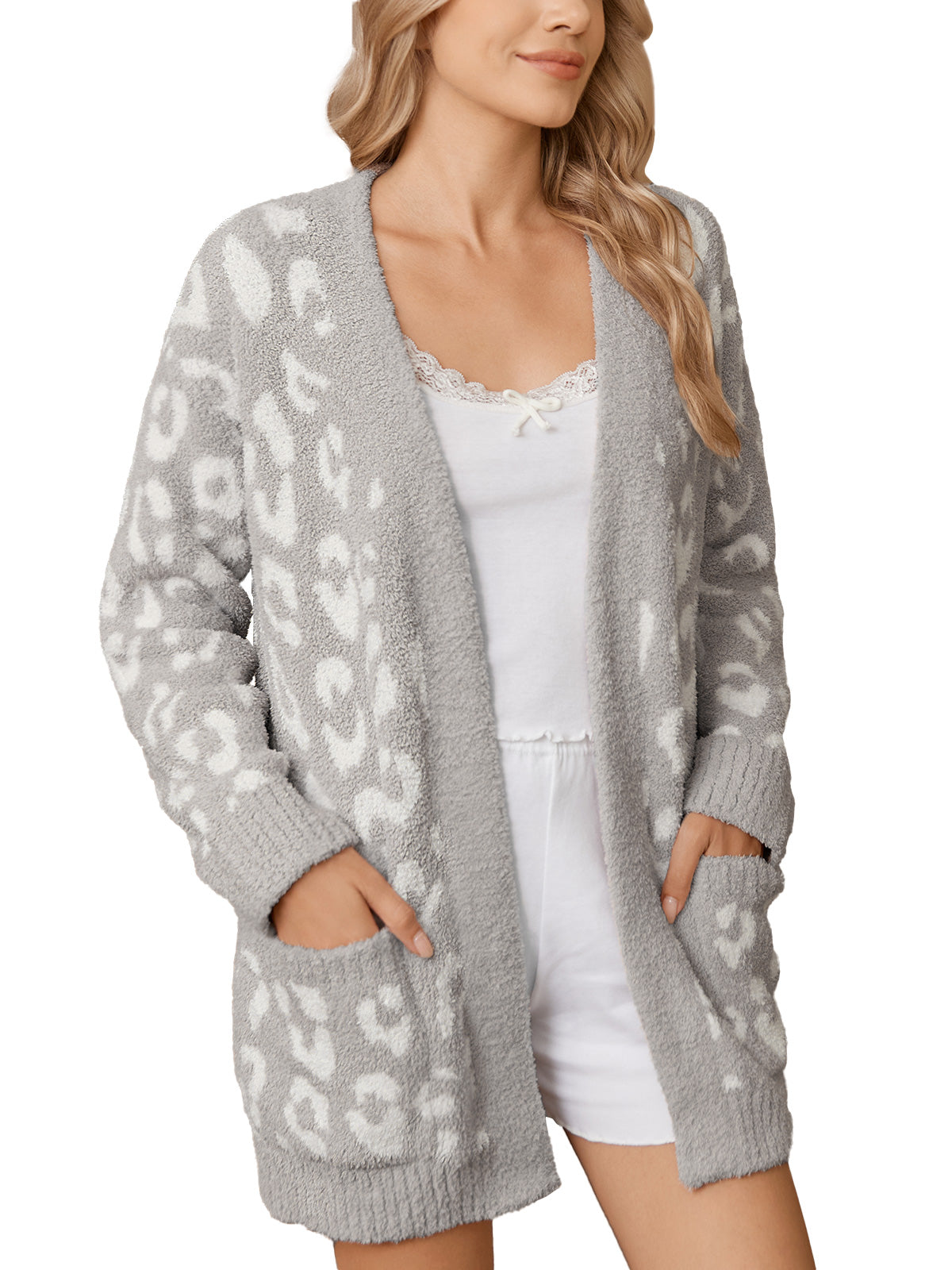 Woman wearing a gray cardigan with white leopard print pattern on a white background #color_Leopard Grey