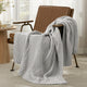 Snuggle Sac chevron chenille knit throw blanket in Light Grey casually draped over a chair in a cozy setting #color_Light Grey