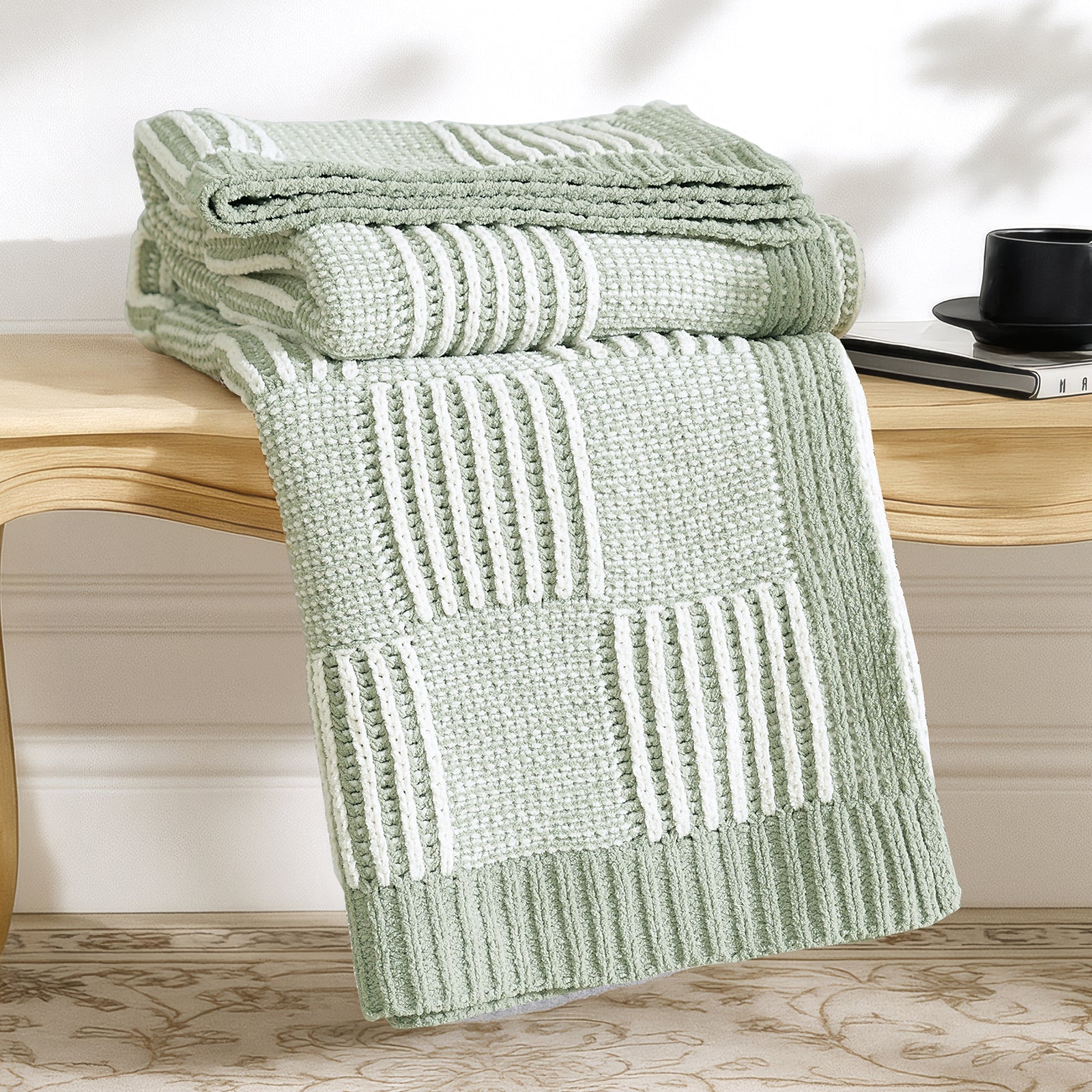 Snuggle Sac two tone checkered chenille knit throw blanket in Sage Green neatly folded on a wooden table #color_Sage Green