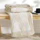 Snuggle Sac two tone checkered chenille knit throw blanket in Khaki neatly folded on a wooden table #color_Khaki