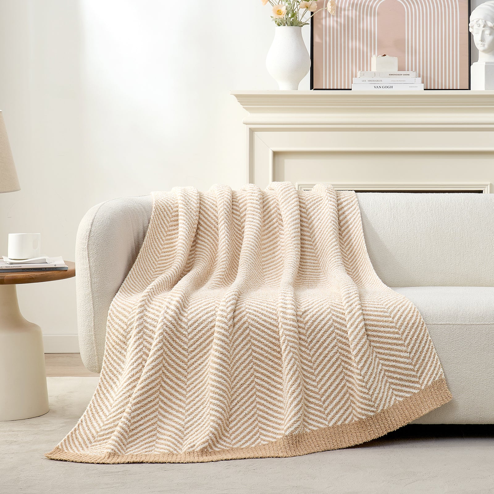Snuggle Sacs Herringbone Feather Yarn Knit Throw Blanket on the couch with furnitures behind#color_Beige