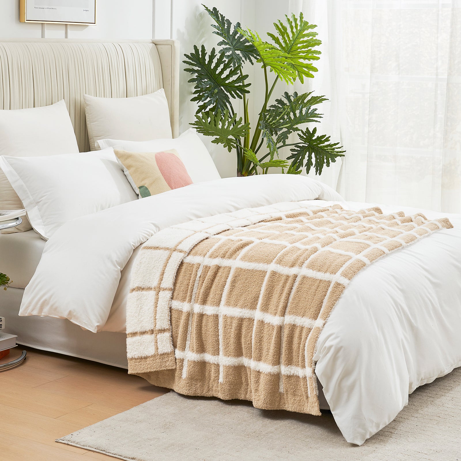 Beige and white checkered faux fur knit throw blanket on the bed.#color_Beige