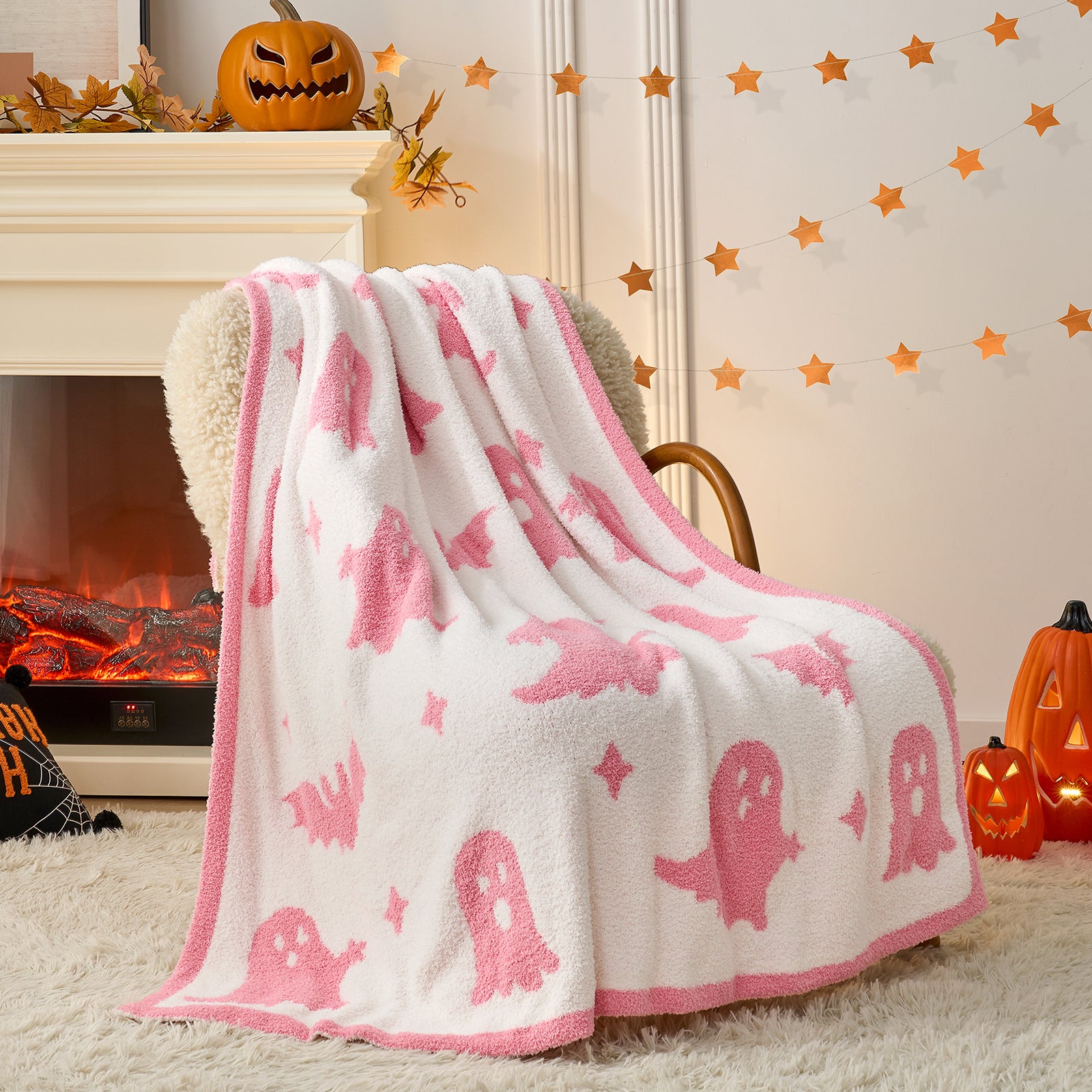 Reversible pink ghost throw blanket
