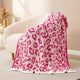 Reversible Leopard Feather Yarn Knit Throw Blanket on a beige couch in a bright room  #Color_Hot Pink