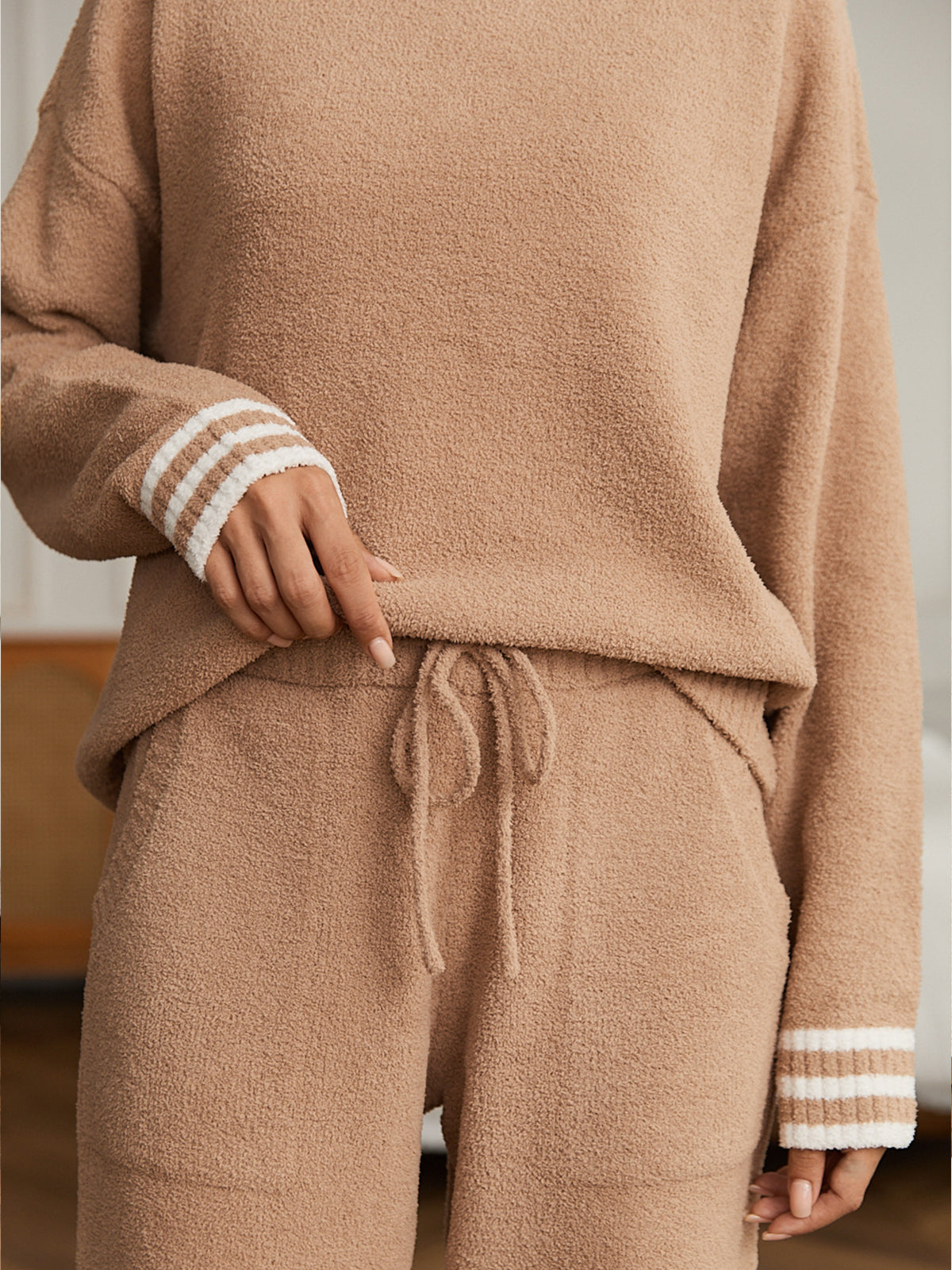 Brown fleece loungewear set with white stripes on cuffs and drawstring. #color_Khaki