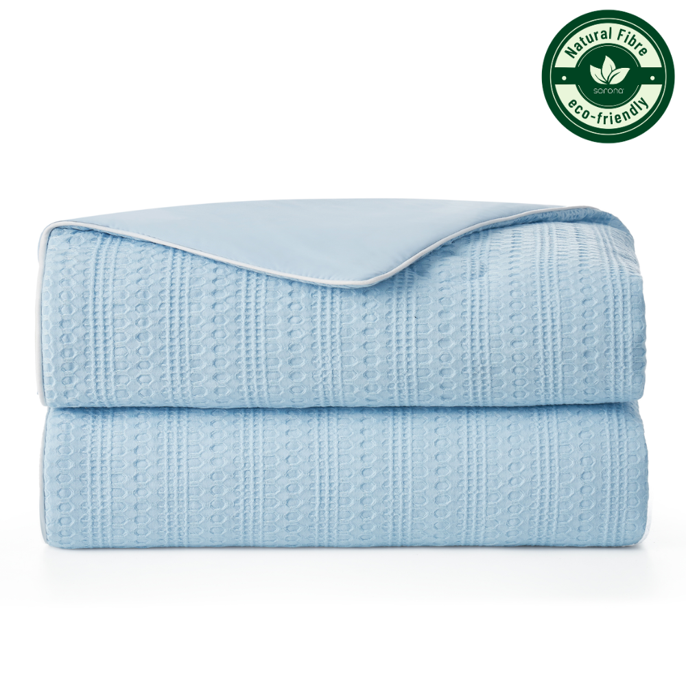 Folded Blue Snuggle Sac Natural Fiber Waffle Cooling Comforter, featuring Sorona natural fiber#color_Blue