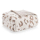 Snuggle Sac leopard faux fur knit throw blanket in Leopard Beige folded front view #color_Leopard Beige