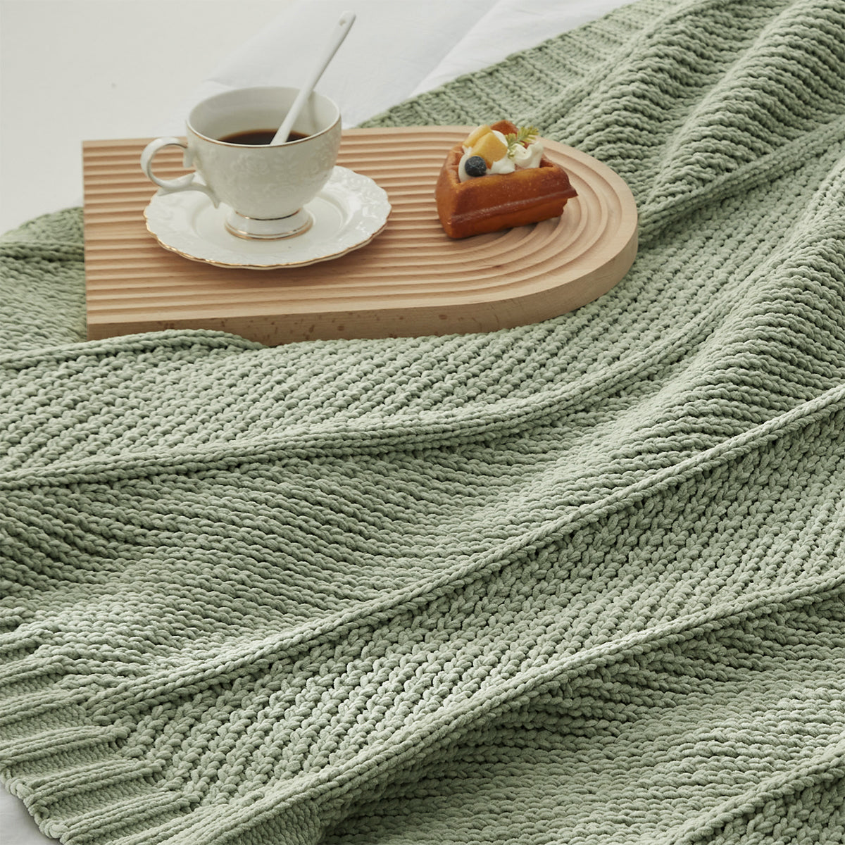 Close up of chevron chenille knit throw blanket in Sage Green showing textured weave #color_Sage Green