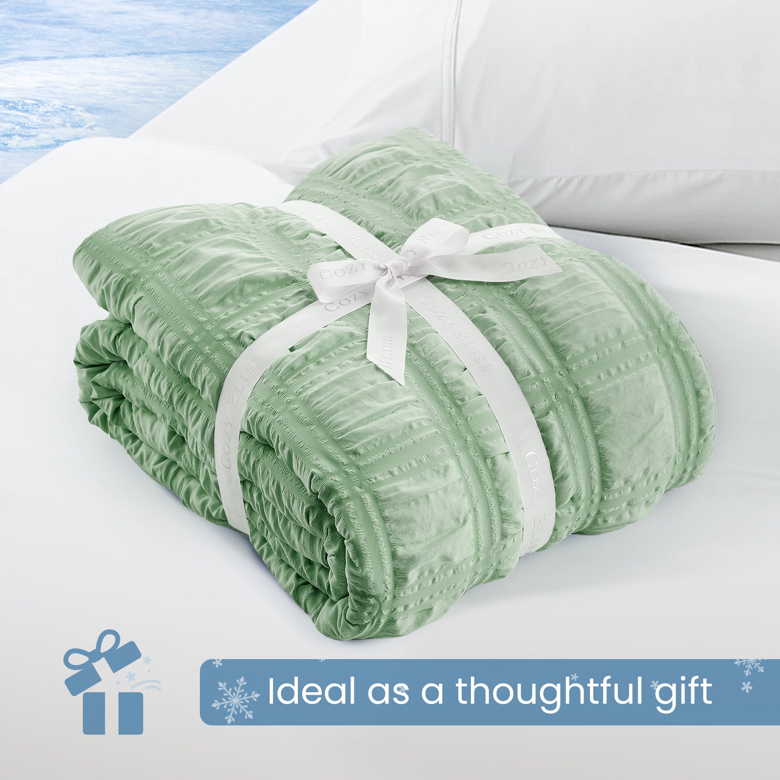 Folded Snuggle Sac sage green comforter with white ribbon,perfect as gift.#color_Sage Green
