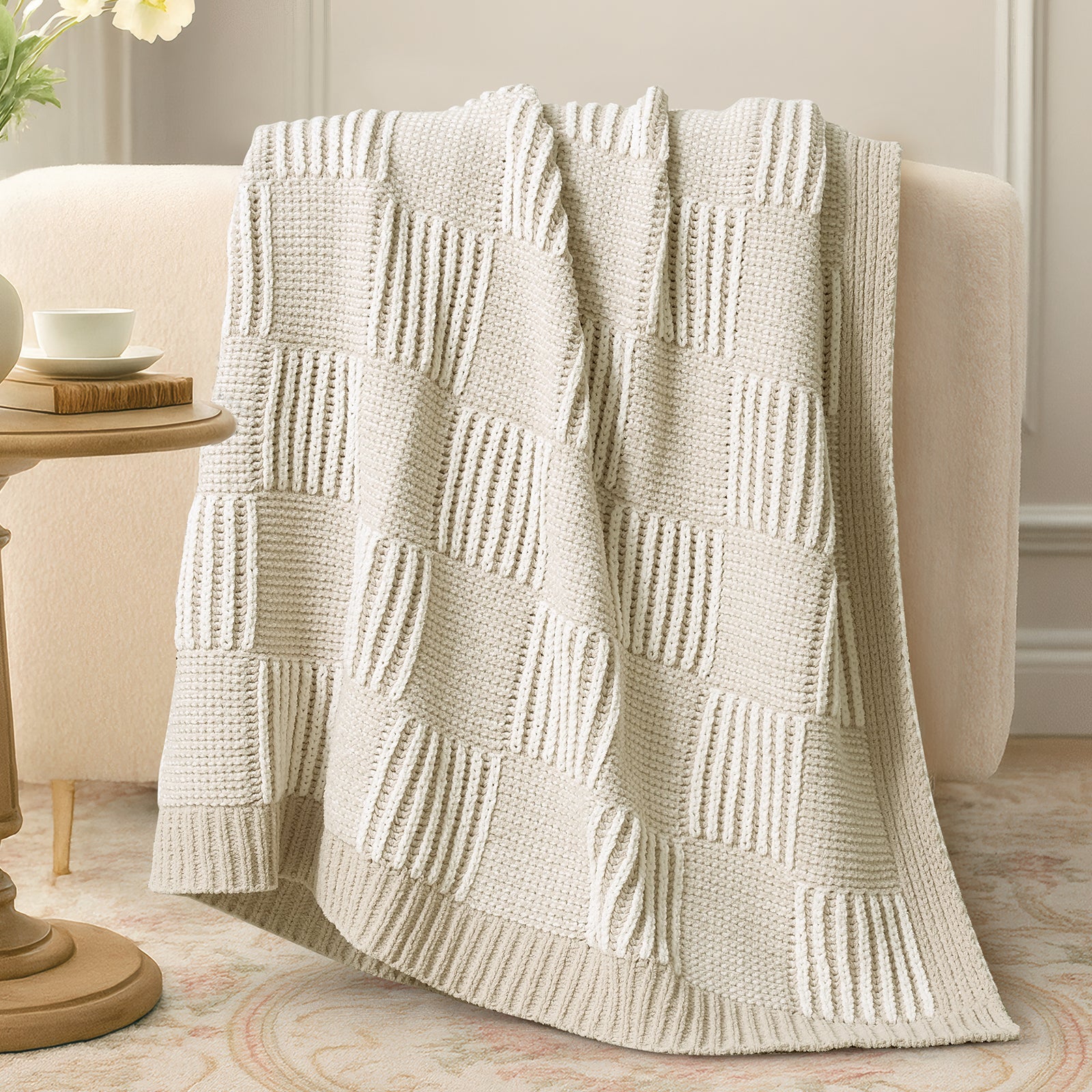 Two tone checkered chenille knit throw blanket in Khaki draped over sofa creating a warm and inviting look #color_Khaki