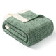 Folded Snuggle Sac Heather Feather Yarn Heather Green Knit Throw Blanket front view#Color_Heather Green