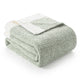 Folded Snuggle Sac Heather Feather Yarn sage green Knit Throw Blanket front view#Color_Sage Green